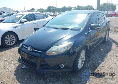 2014 Ford Focus Titanium from USA, damaged, VIN 1FADP3J23EL429773